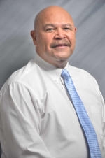 Dr. Carl Amos